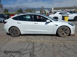 2023 Tesla Model 3 with VIN 5YJ3E1EA8PF398110, listed as a IAAI auction lot 41692006 with 112,699 mi miles and . Bid and sale history available at carsss.com. Image 13.