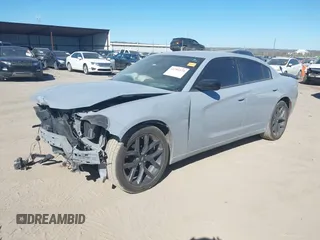 2022 Dodge Charger SXT with VIN 2C3CDXBG7NH208839, listed as a IAAI auction lot 41701171 with 71,552 mi miles and . Bid and sale history available at DreamBid. Image 2.