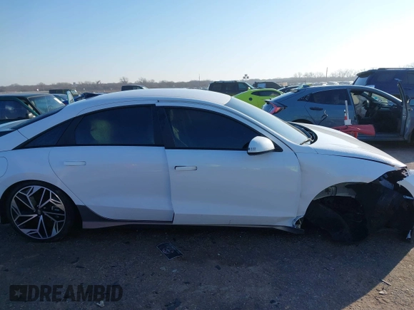 2023 Hyundai Ioniq 6 SEL z VIN KMHM34AA6PA052093, wystawiony jako IAAI lot #41233794 z przebiegiem 8 300 mil mil oraz . Historia ofert i sprzedaży dostępna na DreamBid. Obrazek 12.