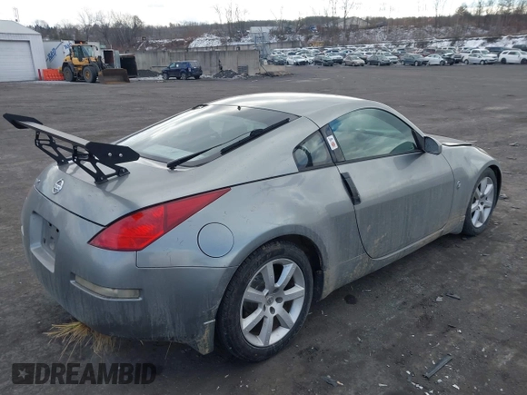 2005 Nissan 350Z Touring with VIN JN1AZ34E85M652465, listed as a IAAI auction lot 41418161 with 153,099 mi miles. Bid and sale history available at carsss.com. Image 4.