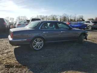 2004 Jaguar XJ with VIN SAJWA73B64TG28182, listed as a Copart auction lot 78380674 with 0 mi miles and Salvage Title. Bid and sale history available at carsss.com. Image 3.