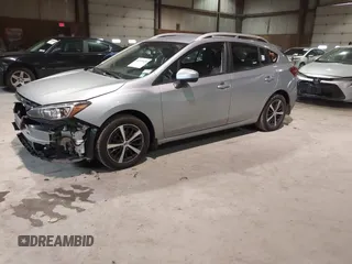 2019 Subaru Impreza Premium with VIN 4S3GTAC68K3719087, listed as a IAAI auction lot 41211628 with 145,774 mi miles. Bid and sale history available at carsss.com. Image 2.