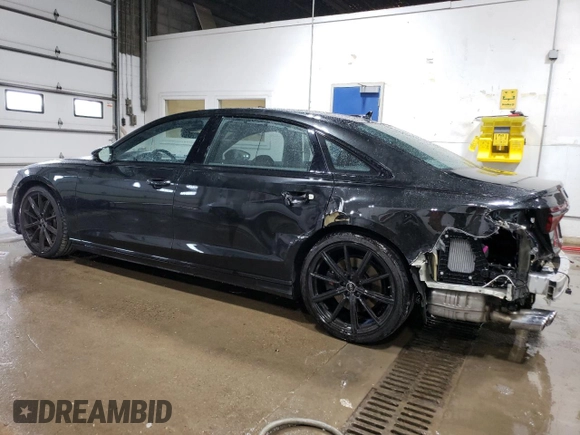 2023 Audi S8 z VIN WAULSAF84PN009501, wystawiony jako Copart lot #62595324 z przebiegiem 18 928 mil mil oraz Szkoda całkowita • Salvage title. Historia ofert i sprzedaży dostępna na DreamBid. Obrazek 2.