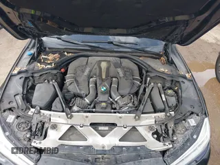 2017 BMW 7 Series 750i with VIN WBA7F0C55HGM21460, listed as a IAAI auction lot 41934198 with 58,206 mi miles and . Bid and sale history available at DreamBid. Image 10.