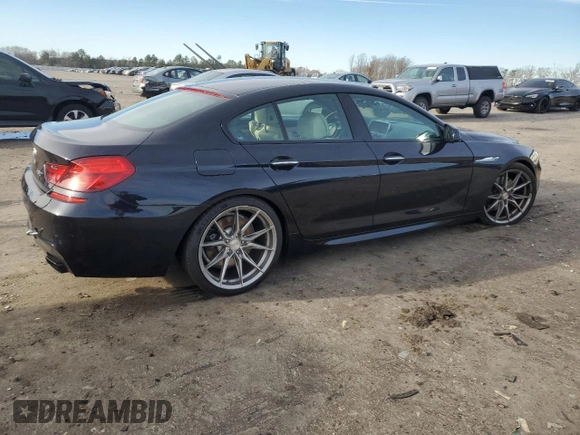 2014 BMW 6 Series 650i z VIN WBA6B2C51ED128896, wystawiony jako Copart lot #84801734 z przebiegiem 142 181 mil mil oraz Szkoda całkowita • Salvage title. Historia ofert i sprzedaży dostępna na DreamBid. Obrazek 3.