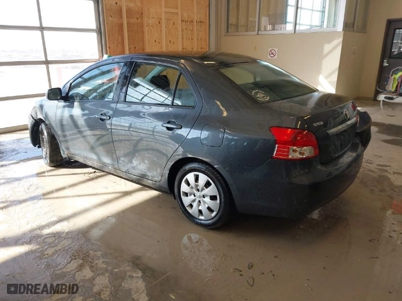 2010 Toyota Yaris with VIN JTDBT4K38A1355010, listed as a IAAI auction lot 41563391 with 154,835 mi miles. Bid and sale history available at carsss.com. Image 3.