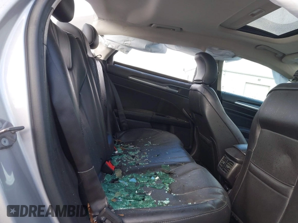 2016 Ford Fusion Titanium with VIN 3FA6P0K96GR101285, listed as a IAAI auction lot 41214633 with 113,633 mi miles and . Bid and sale history available at carsss.com. Image 8.