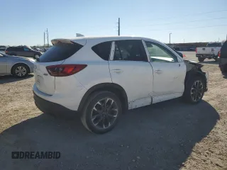 2016 Mazda CX-5 Grand Touring with VIN JM3KE2DY4G0704001, listed as a Copart auction lot 49666445 with 149,000 mi miles and Salvage Title. Bid and sale history available at carsss.com. Image 3.