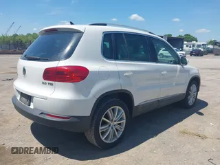 2013 Volkswagen Tiguan SE with VIN WVGAV7AX4DW528410, listed as a IAAI auction lot 42142132 with 148,511 mi miles and . Bid and sale history available at DreamBid. Image 4.