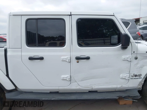 2021 Jeep Gladiator High Altitude with VIN 1C6HJTFG8ML551570, listed as a IAAI auction lot 42229235 with 56,959 mi miles and . Bid and sale history available at DreamBid. Image 14.