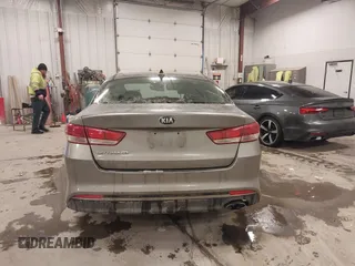 2017 Kia Optima LX with VIN 5XXGT4L33HG148897, listed as a IAAI auction lot 41565592 with 61,471 mi miles and . Bid and sale history available at carsss.com. Image 17.