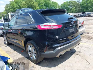 2021 Ford Edge Titanium z VIN 2FMPK3K96MBA16046, wystawiony jako IAAI lot #42137419 z przebiegiem 88 622 mil mil oraz . Historia ofert i sprzedaży dostępna na DreamBid. Obrazek 3.