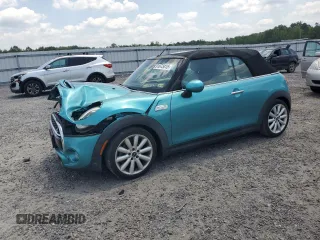 2018 MINI Convertible Cooper S с VIN WMWWG9C59J3D22587, выставлен на аукционе Copart как лот 61673415 с пробегом 34 935 миль миль и Списание • Salvage title. История ставок и продаж доступна на DreamBid. Изображение 1.