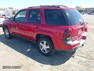 2004 Chevrolet TrailBlazer LT with VIN 1GNDS13S842376090, listed as a IAAI auction lot 42075638 with 112,519 mi miles. Bid and sale history available at carsss.com. Image 3.