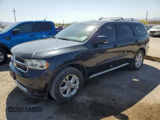2012 Dodge Durango Crew with VIN 1C4RDHDG5CC320032, listed as a Copart auction lot 51966765 with 202,557 mi miles and Salvage Title. Bid and sale history available at DreamBid. Image 1.