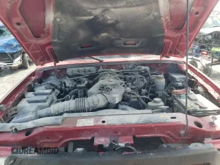2010 Ford Ranger XLT z VIN 1FTKR4EE3APA70305, wystawiony jako Copart lot #61850725 z przebiegiem 174 677 mil mil oraz Szkoda całkowita • Salvage title. Historia ofert i sprzedaży dostępna na DreamBid. Obrazek 11.
