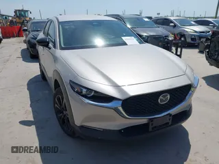 2024 Mazda CX-30 S Select Sport z VIN 3MVDMBBM9RM664436, wystawiony jako IAAI lot #42265634 z przebiegiem 29 568 mil mil oraz . Historia ofert i sprzedaży dostępna na DreamBid. Obrazek 1.