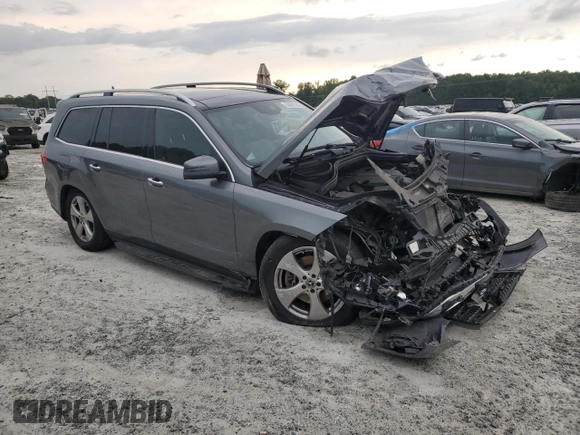 2017 Mercedes-Benz GLS with VIN 4JGDF6EE8HA990971, listed as a Copart auction lot 64061083 with 81,712 mi miles. Bid and sale history available at carsss.com. Image 4.