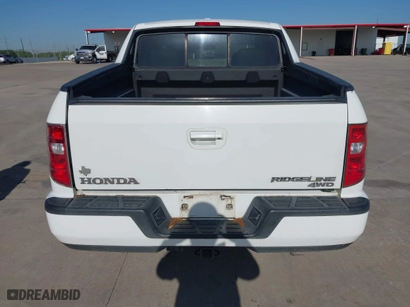 2010 Honda Ridgeline RTL with VIN 5FPYK1F54AB011339, listed as a IAAI auction lot 41983918 with 201,124 mi miles. Bid and sale history available at carsss.com. Image 16.