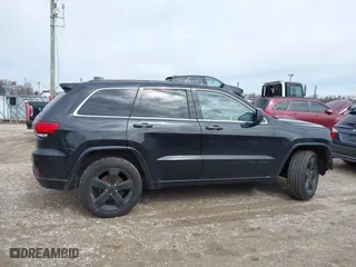 2015 Jeep Grand Cherokee Altitude with VIN 1C4RJFAG2FC956607, listed as a IAAI auction lot 41818479 with 98,879 mi miles. Bid and sale history available at carsss.com. Image 13.