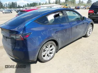 2024 Tesla Model Y Long Range z VIN 7SAYGAEE0RF074822, wystawiony jako IAAI lot #42098821 z przebiegiem Nie podano mil oraz . Historia ofert i sprzedaży dostępna na DreamBid. Obrazek 4.