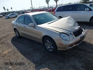 2005 Mercedes-Benz E-Class 3.2L with VIN WDBUF65J05A706096, listed as a IAAI auction lot 41482289 with 110,531 mi miles. Bid and sale history available at carsss.com. Image 1.