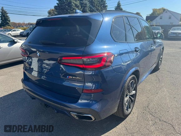 2021 BMW X5 M50i with VIN 5UXJU4C00M9H36466, listed as a Copart auction lot 77444344 with 100,119 mi miles and Clean Title. Bid and sale history available at carsss.com. Image 3.