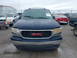 2005 GMC Yukon SLT with VIN 1GKEC13T45J139885, listed as a IAAI auction lot 41796394 with 229,494 mi miles. Bid and sale history available at carsss.com. Image 12.