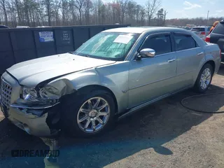2006 Chrysler 300 C with VIN 2C3LA63H06H105774, listed as a IAAI auction lot 41918634 with 319,232 mi miles. Bid and sale history available at carsss.com. Image 17.
