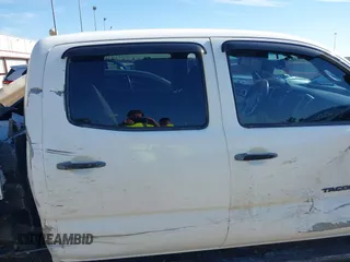 2013 Toyota Tacoma PreRunner with VIN 3TMKU4HN8DM038566, listed as a IAAI auction lot 41296386 with 153,240 mi miles and . Bid and sale history available at DreamBid. Image 19.