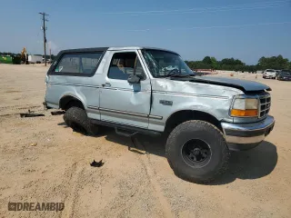 1996 Ford Bronco Custom with VIN 1FMEU15H2TLA98333, listed as a Copart auction lot 67065144 with 347,019 mi miles and Salvage Title. Bid and sale history available at carsss.com. Image 4.