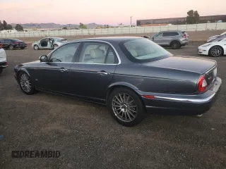 2007 Jaguar XJ with VIN SAJWA71B27SH17096, listed as a Copart auction lot 78863314 with 132,779 mi miles and Salvage Title. Bid and sale history available at carsss.com. Image 2.