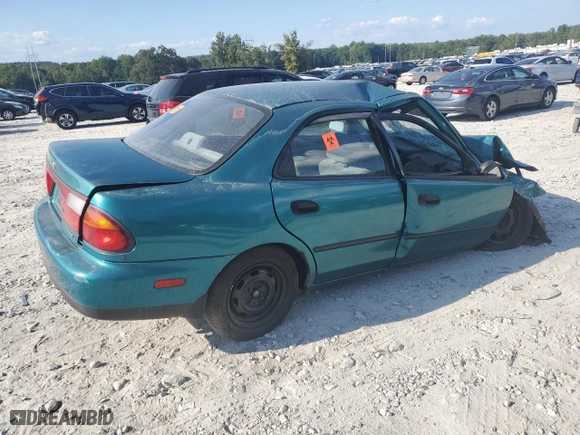 1997 Mazda Protege DX with VIN JM1BC1415V0118853, listed as a Copart auction lot 71678334 with 0 mi miles and Salvage Title. Bid and sale history available at carsss.com. Image 3.