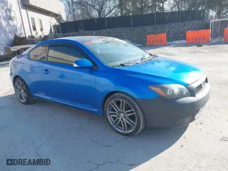 2010 Scion tC with VIN JTKDE3B78A0315248, listed as a IAAI auction lot 41442648 with 125,037 mi miles. Bid and sale history available at carsss.com. Image 1.
