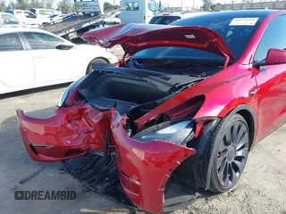 2024 Tesla Model Y Performance with VIN 7SAYGDEF3RF032980, listed as a IAAI auction lot 41619450 with 12,105 mi miles and . Bid and sale history available at DreamBid. Image 6.