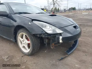 2000 Toyota Celica GT with VIN JTDDR32T7Y0006809, listed as a IAAI auction lot 41860933 with 262,014 mi miles. Bid and sale history available at carsss.com. Image 6.