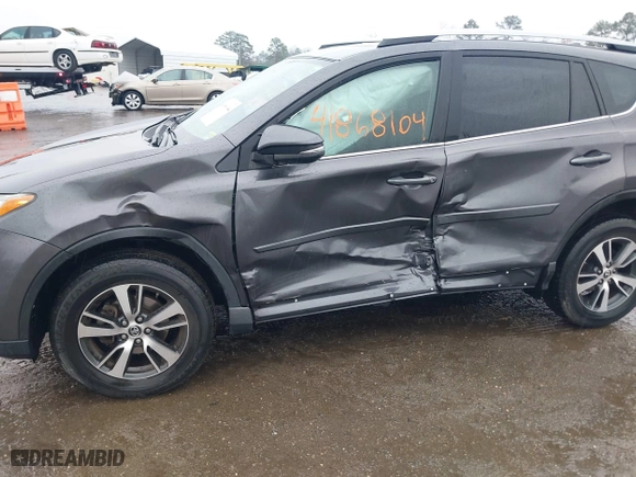 2018 Toyota RAV4 XLE with VIN 2T3RFREV5JW798328, listed as a IAAI auction lot 41868104 with 61,076 mi miles. Bid and sale history available at carsss.com. Image 6.