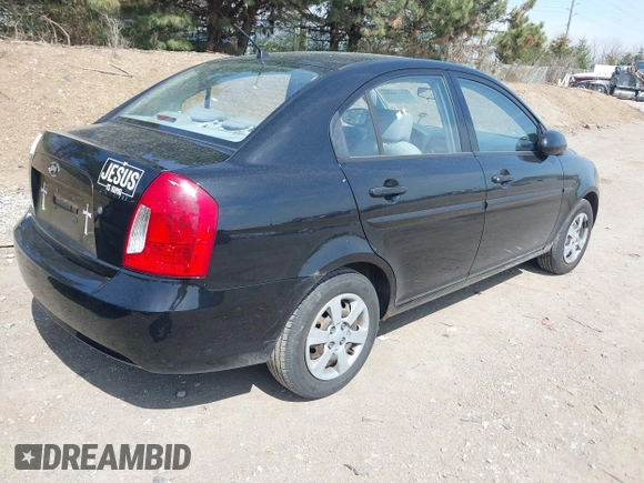 2006 Hyundai Accent GLS with VIN KMHCN46C36U018237, listed as a IAAI auction lot 41916524 with 92,427 mi miles. Bid and sale history available at carsss.com. Image 4.