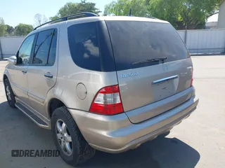 2002 Mercedes-Benz M 320/430/500 with VIN 4JGAB75E52A302663, listed as a IAAI auction lot 41865160 with 231,223 mi miles and . Bid and sale history available at DreamBid. Image 3.