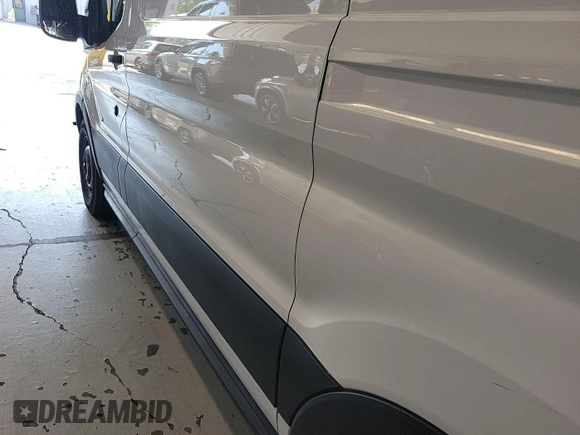 2019 Ford Transit with VIN 1FTYE1CG3KKB86885, listed as a IAAI auction lot 42907665 with 122,910 mi miles and . Bid and sale history available at DreamBid. Image 4.
