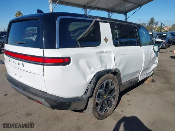 2025 Rivian R1S Adventure with VIN 7PDSGBBA1SN051995, listed as a IAAI auction lot 40923427 with 1 mi miles. Bid and sale history available at carsss.com. Image 4.