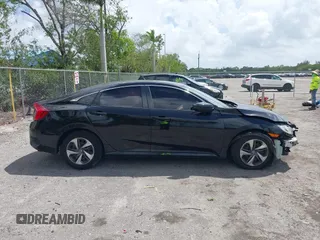 2020 Honda Civic LX z VIN 2HGFC2F61LH600469, wystawiony jako IAAI lot #41958201 z przebiegiem 66 249 mil mil oraz . Historia ofert i sprzedaży dostępna na DreamBid. Obrazek 14.