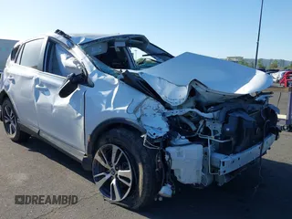 2018 Toyota RAV4 XLE with VIN 2T3WFREV3JW484955, listed as a IAAI auction lot 42262089 with 118,527 mi miles and . Bid and sale history available at DreamBid. Image 1.