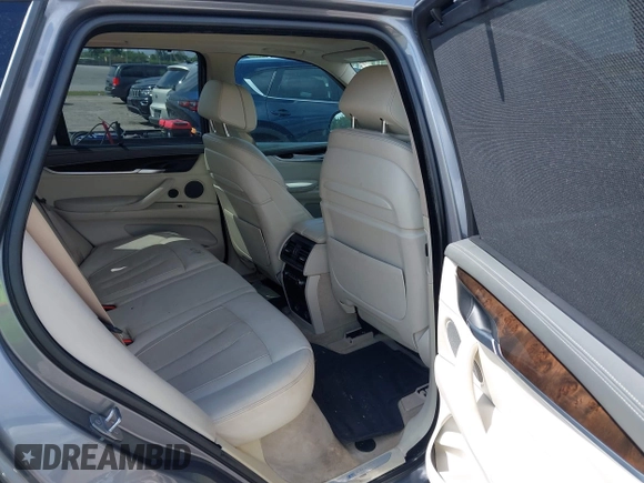 2016 BMW X5 xDrive40e with VIN 5UXKT0C58G0S75938, listed as a IAAI auction lot 42021138 with 97,426 mi miles and . Bid and sale history available at DreamBid. Image 8.