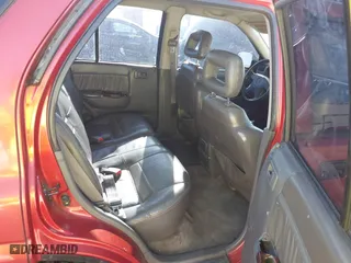 1999 Isuzu Rodeo S with VIN 4S2CK58W3X4307201, listed as a IAAI auction lot 41884901 with 236,970 mi miles. Bid and sale history available at carsss.com. Image 8.
