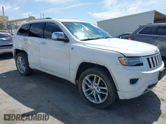 2015 Jeep Grand Cherokee Overland with VIN 1C4RJFCG3FC230185, listed as a IAAI auction lot 42494650 with 123,128 mi miles and . Bid and sale history available at DreamBid. Image 1.