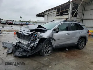 2024 Toyota RAV4 Hybrid XLE Premium with VIN 4T3B6RFV9RU167402, listed as a Copart auction lot 89083875 with 5,923 mi miles and Salvage Title. Bid and sale history available at DreamBid. Image 1.