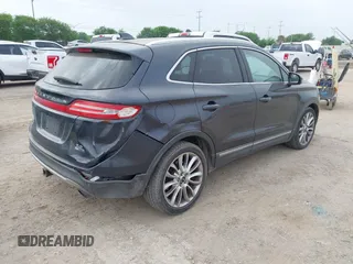 2015 Lincoln MKC with VIN 5LMCJ1A94FUJ13716, listed as a IAAI auction lot 41911220 with 194,825 mi miles. Bid and sale history available at carsss.com. Image 4.