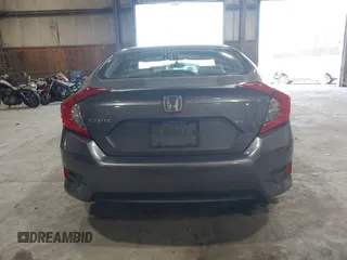 2016 Honda Civic Sedan LX with VIN 19XFC2F58GE214672, listed as a IAAI auction lot 42067792 with 73,929 mi miles. Bid and sale history available at carsss.com. Image 15.