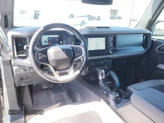 2022 Ford Bronco with VIN 1FMEE5BP4NLB55389, listed as a IAAI auction lot 42444914 with 85,357 mi miles and . Bid and sale history available at DreamBid. Image 1.